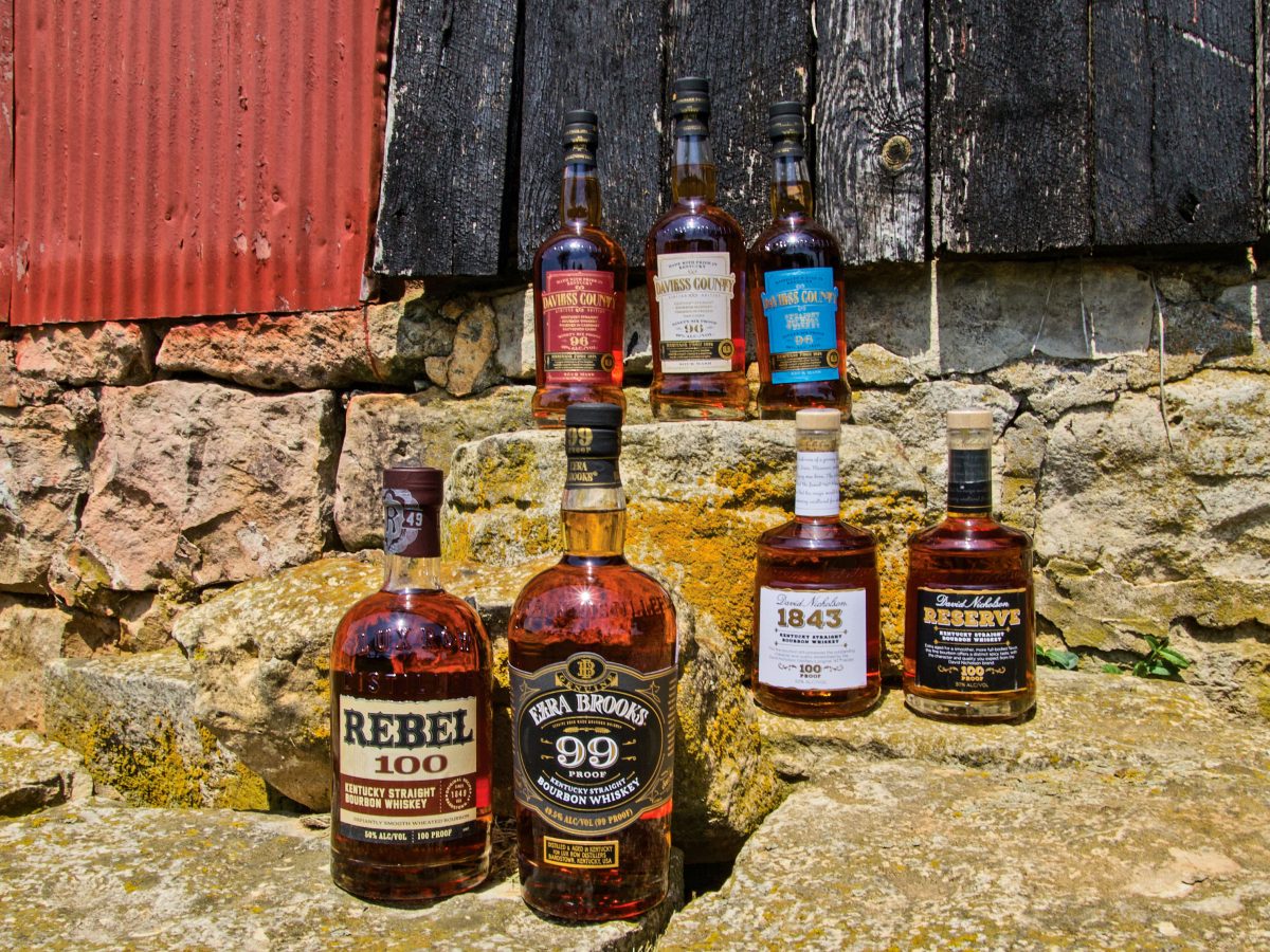 Bottles of bourbon along stone steps