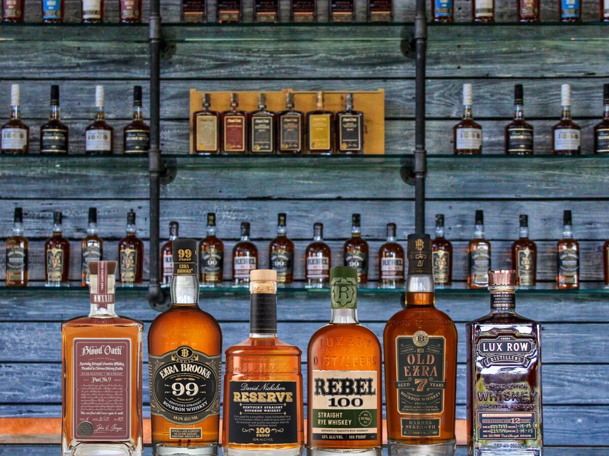 a lineup of Lux Row Distillers whiskeys and bourbons